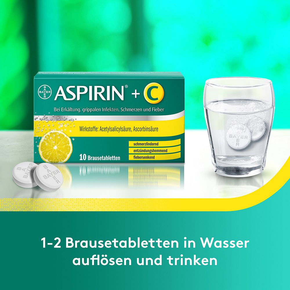 Aspirin +C-Packung und Brausetabletten in Glas Wasser. Text: 1-2 Brausetabletten in Wasser auflösen und trinken.