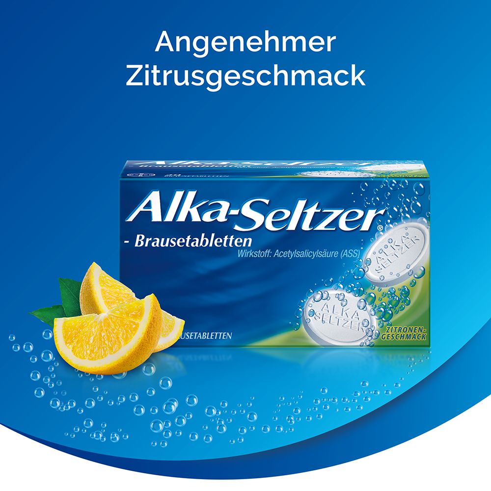 Alka-Seltzer Brausetabletten und Zitronen. Verpackung mit Produktnamen und Zitronen-Geschmack.