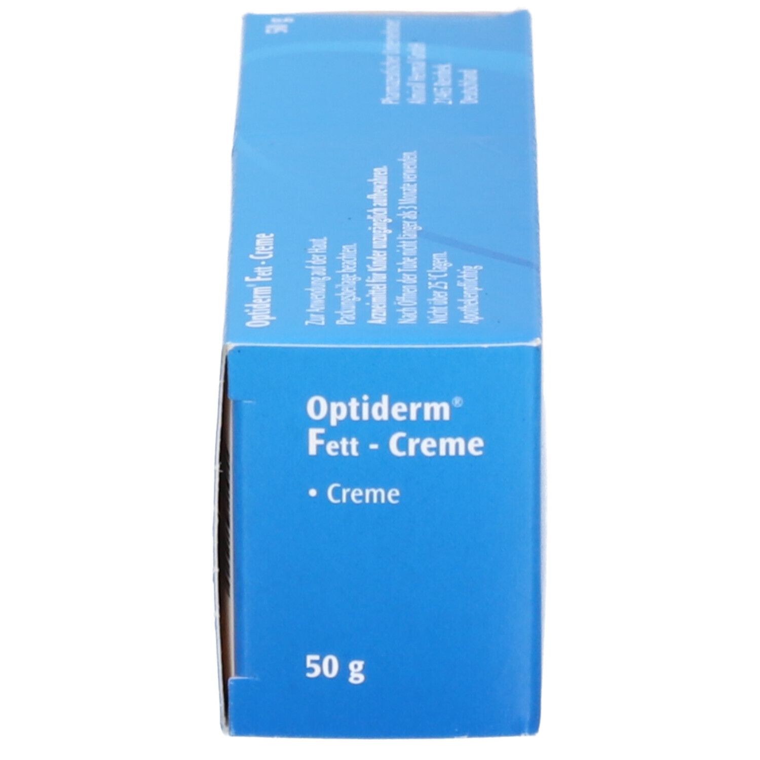 Blaue Schachtel Optiderm® Fett-Creme. Seitenansicht. Produktname und Text auf Deutsch. 50 g.