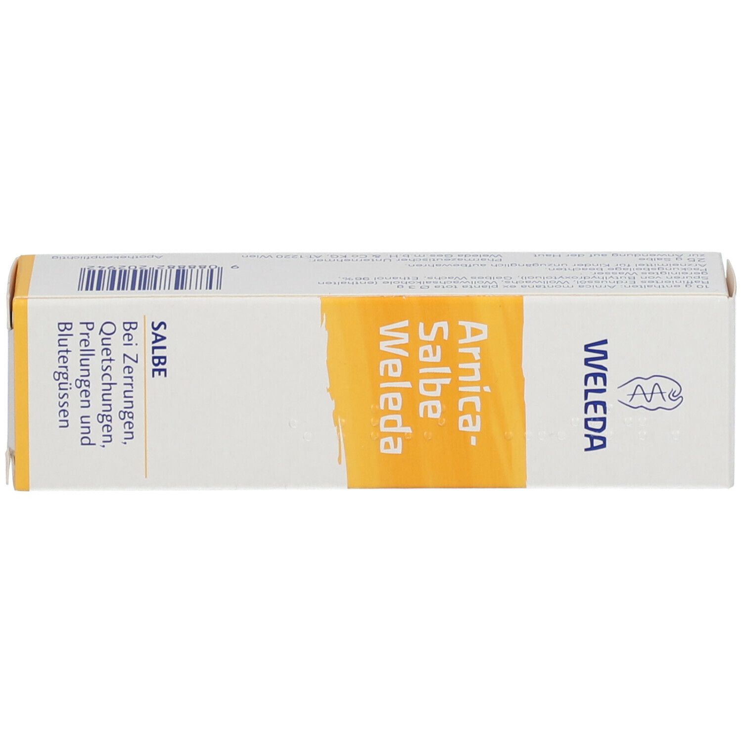 Schachtel, Seitenansicht. Aufschrift: Arnica-Salbe Weleda. Gelber Streifen. Weißer Hintergrund.
