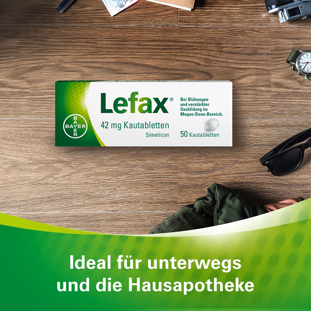 Schachtel Lefax® Kautabletten auf Holz. Text: Ideal für unterwegs und die Hausapotheke.