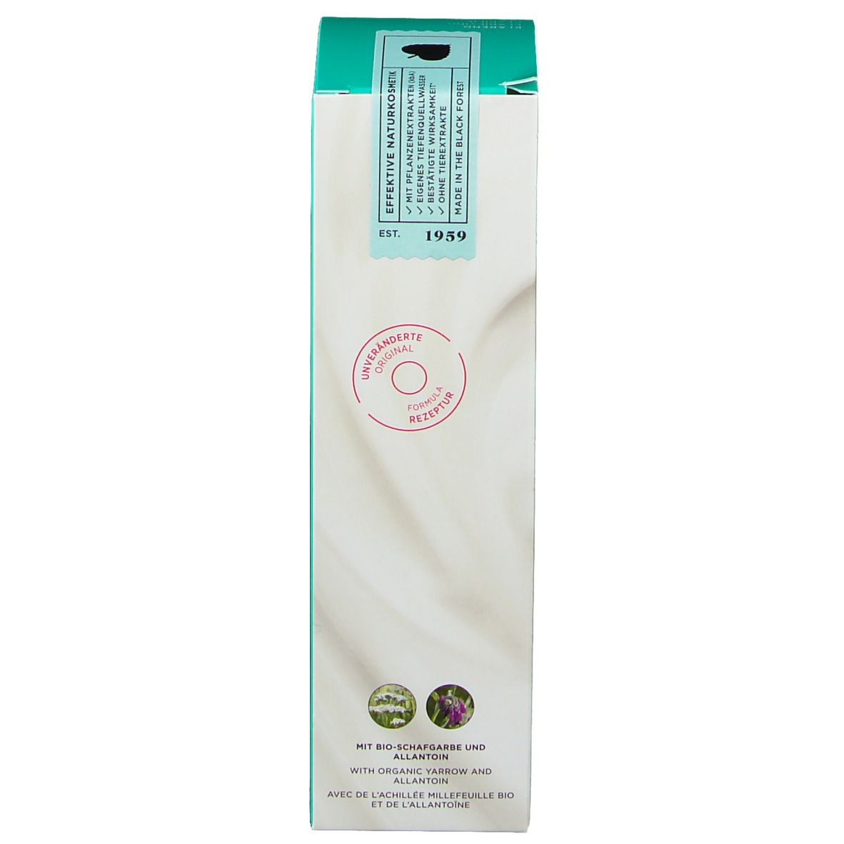 Seitenansicht der Produktverpackung. Logo und Zertifizierungen. Text in mehreren Sprachen. Marke: Annemarie Börlind.