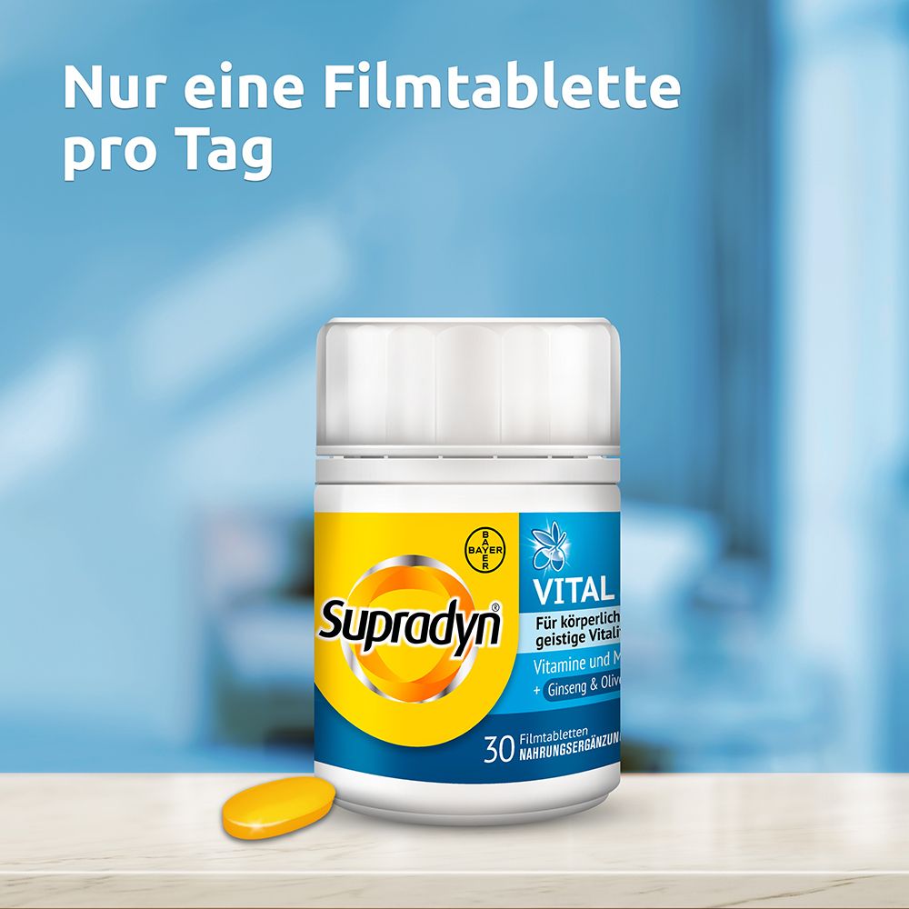 Weißes Tablettenröhrchen mit "Supradyn VITAL 50+". Eine gelbe Tablette liegt daneben.