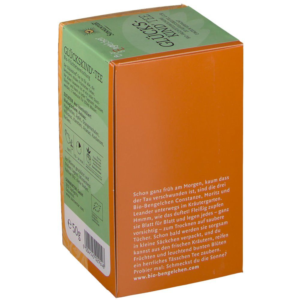 Karton mit Aufdrucken. Aufschrift: Glückskind Tee. Textabschnitt. Bio-Siegel. Orangefarbener Hintergrund mit Blättern. 50g.