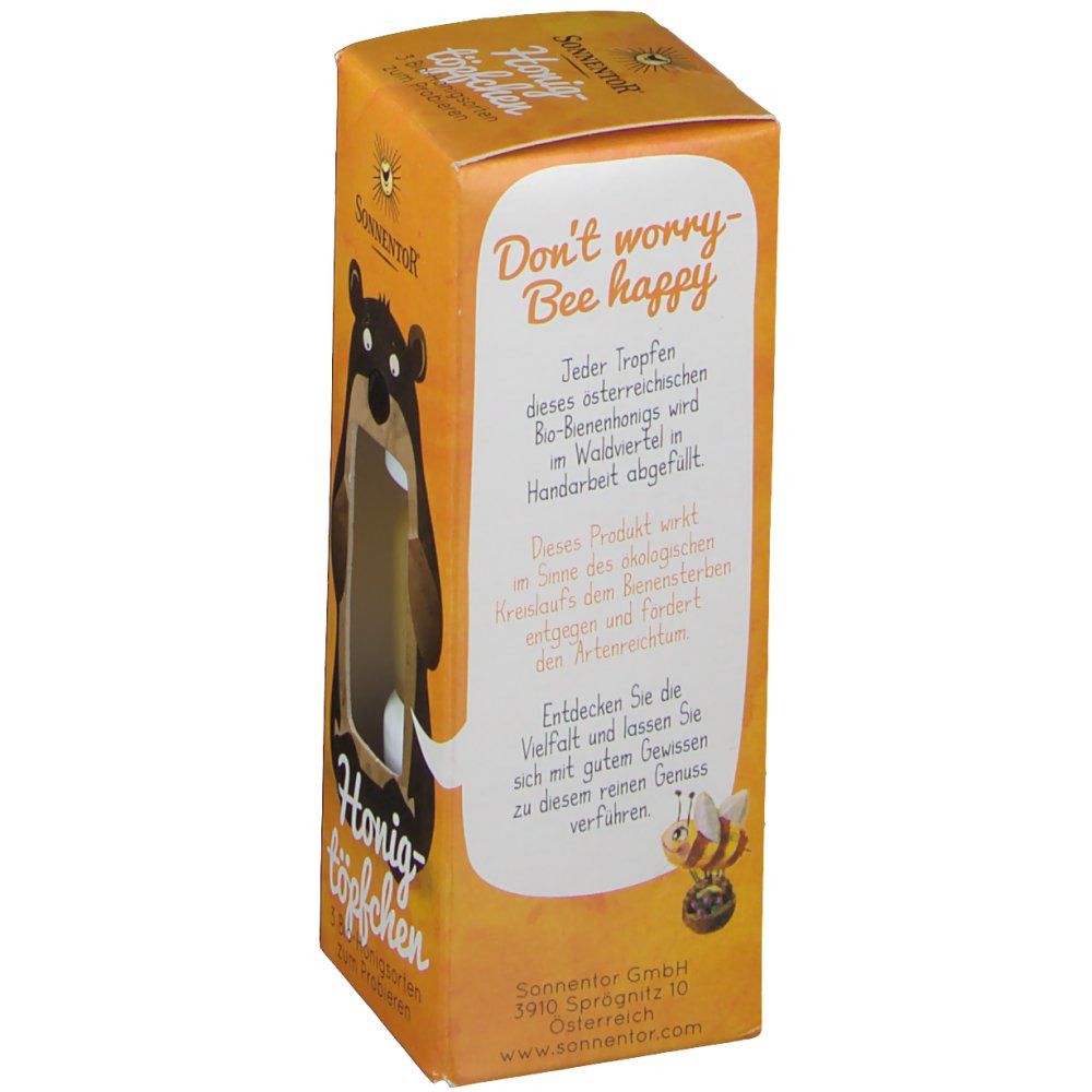 Rückseite der Honigtöpfchen-Verpackung. Text: Don't worry-Bee happy. Informationen über die Herstellung und den Inhalt.