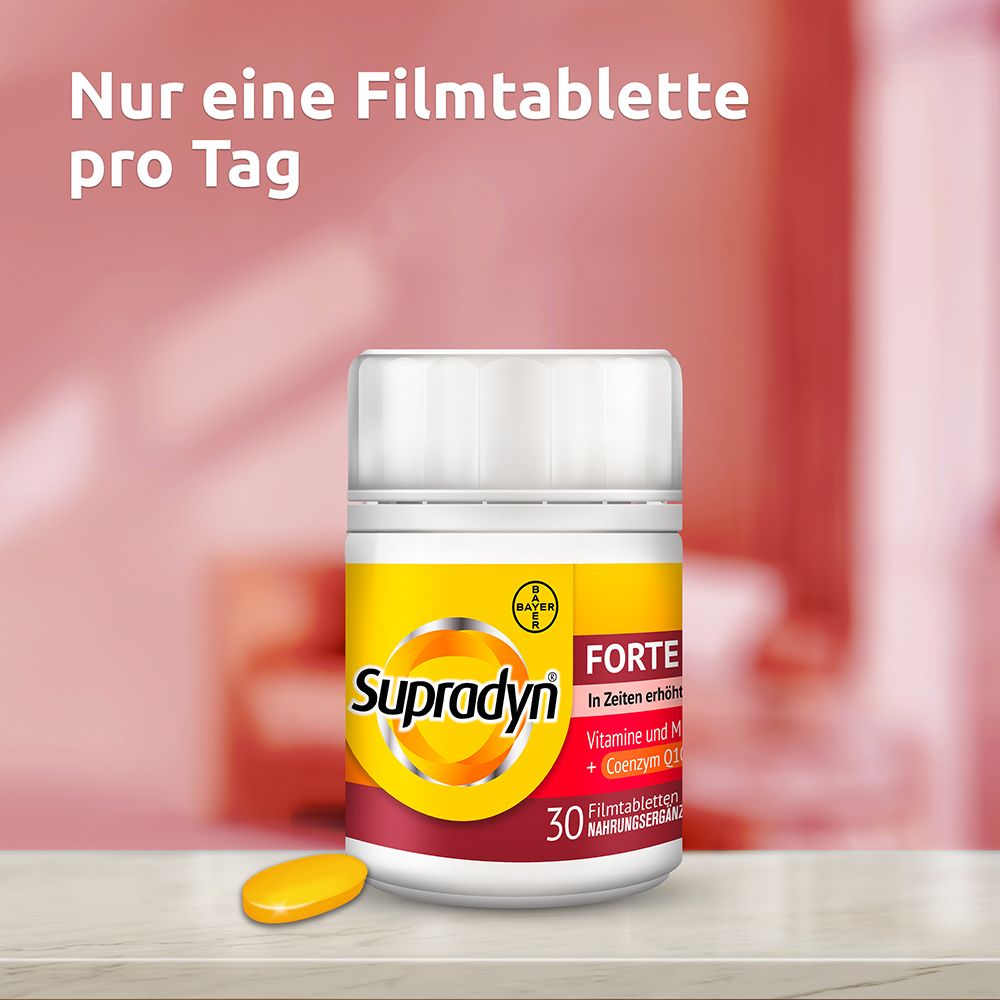 Weiße Flasche mit "Supradyn Forte". 30 Filmtabletten. Gelbe Tablette daneben.