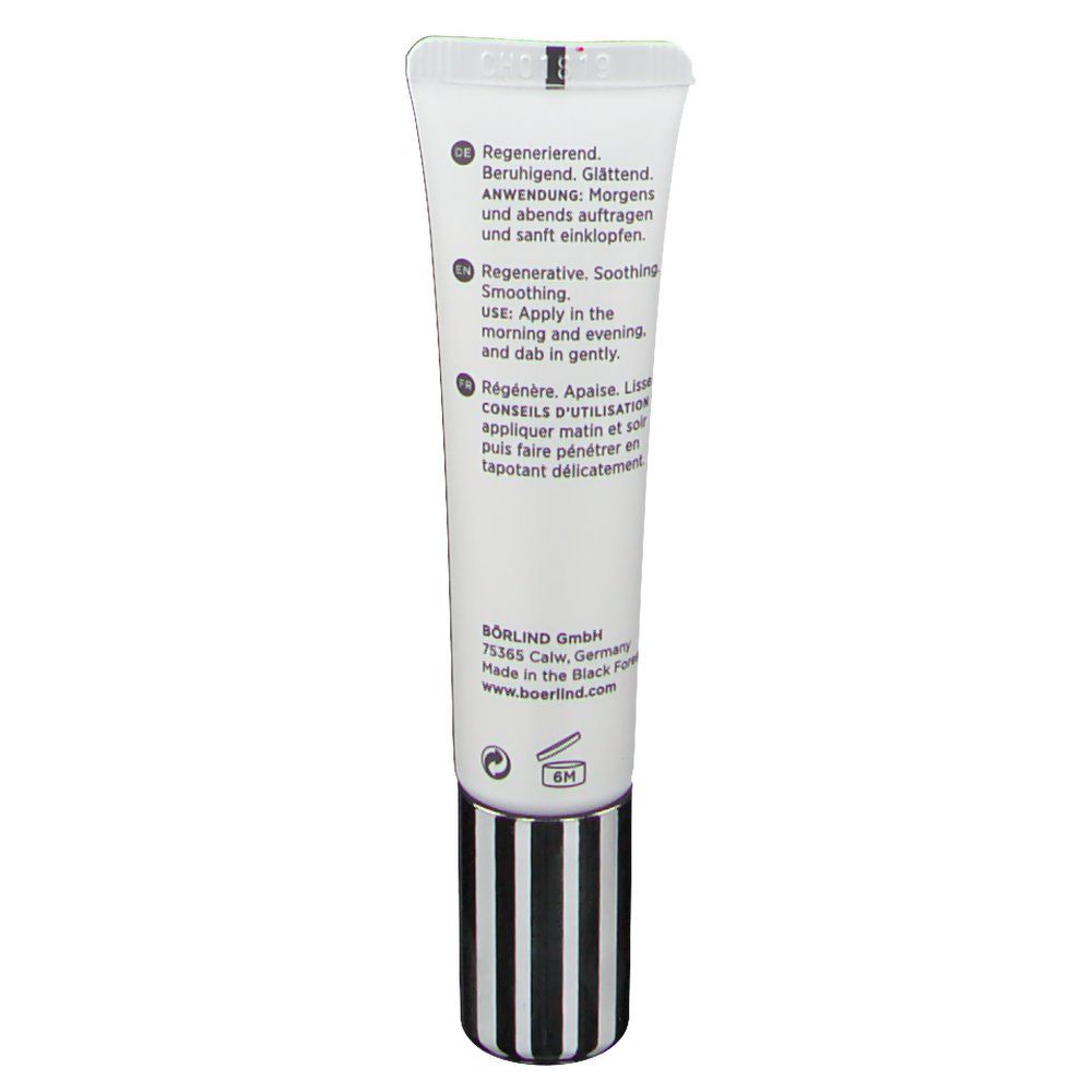 Rückseite der Creme-Tube mit Text. Schwarzer und weißer gestreifter Verschluss.