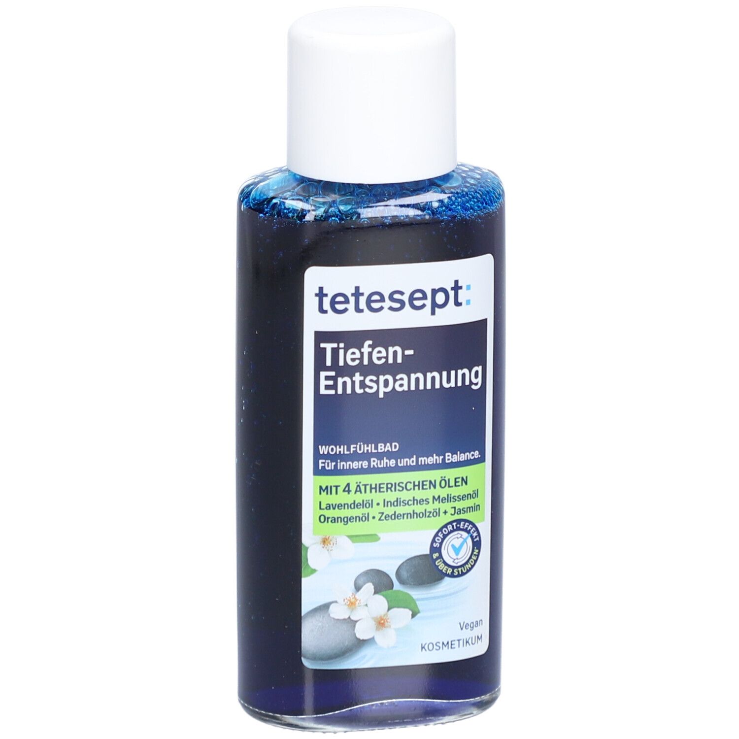 tetesept Tiefen-Entspannung. Flasche mit blauem Inhalt und weißem Deckel. Text: Tiefen-Entspannung, 4 ätherische Öle, Vegan.