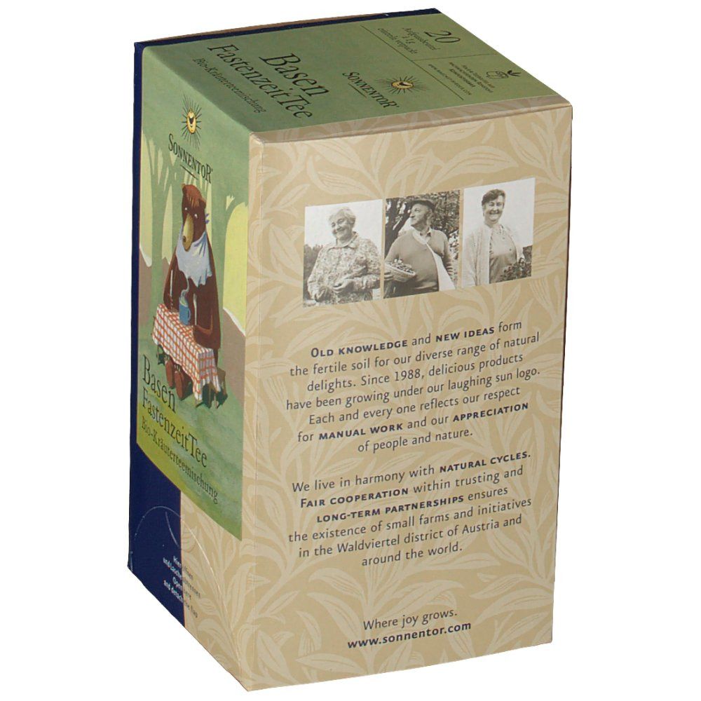 Karton mit Sonnentor® Basen FastenzeitTee. Aufdrucke: Produktname, Logo, Illustration, Text. Rückseite mit Text und Fotos.