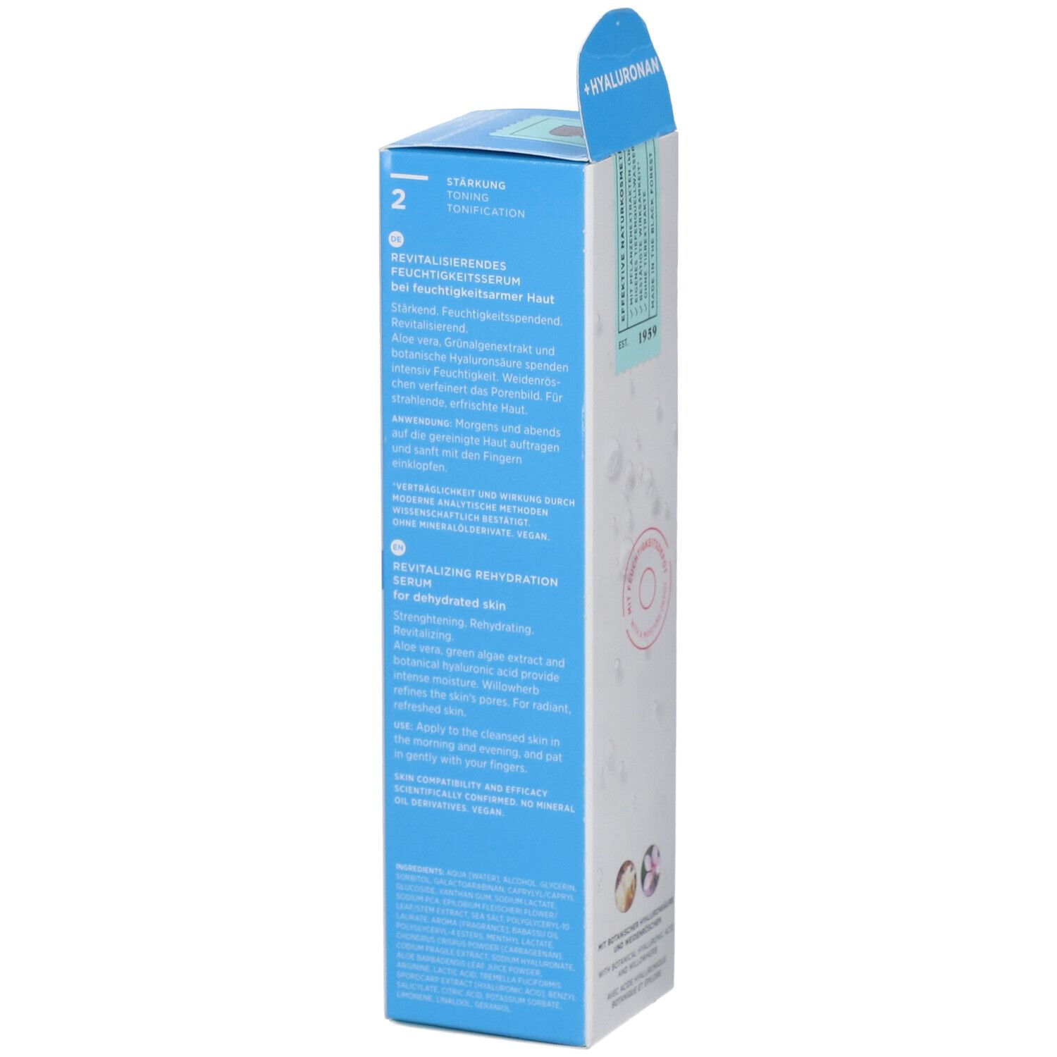Seite der Verpackung des AQUA NATURE Serums. Text in Deutsch und Englisch. Mit floralen Illustrationen.