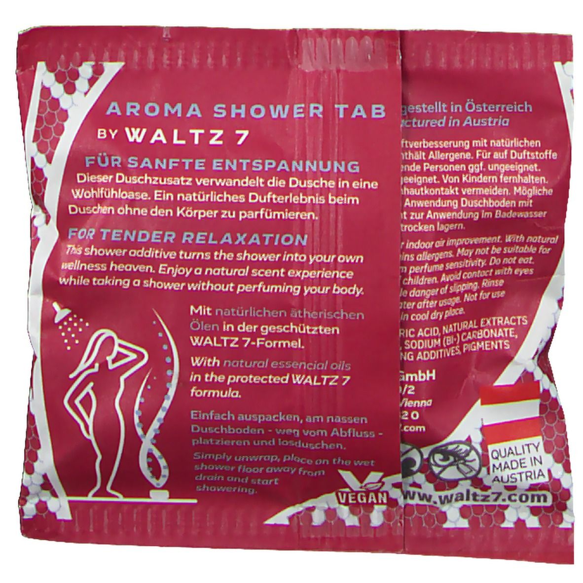 Dos de l'emballage rouge. Texte: AROMA SHOWER TAB BY WALTZ 7. Contient du texte en allemand et en anglais, ainsi que le logo Vegan.