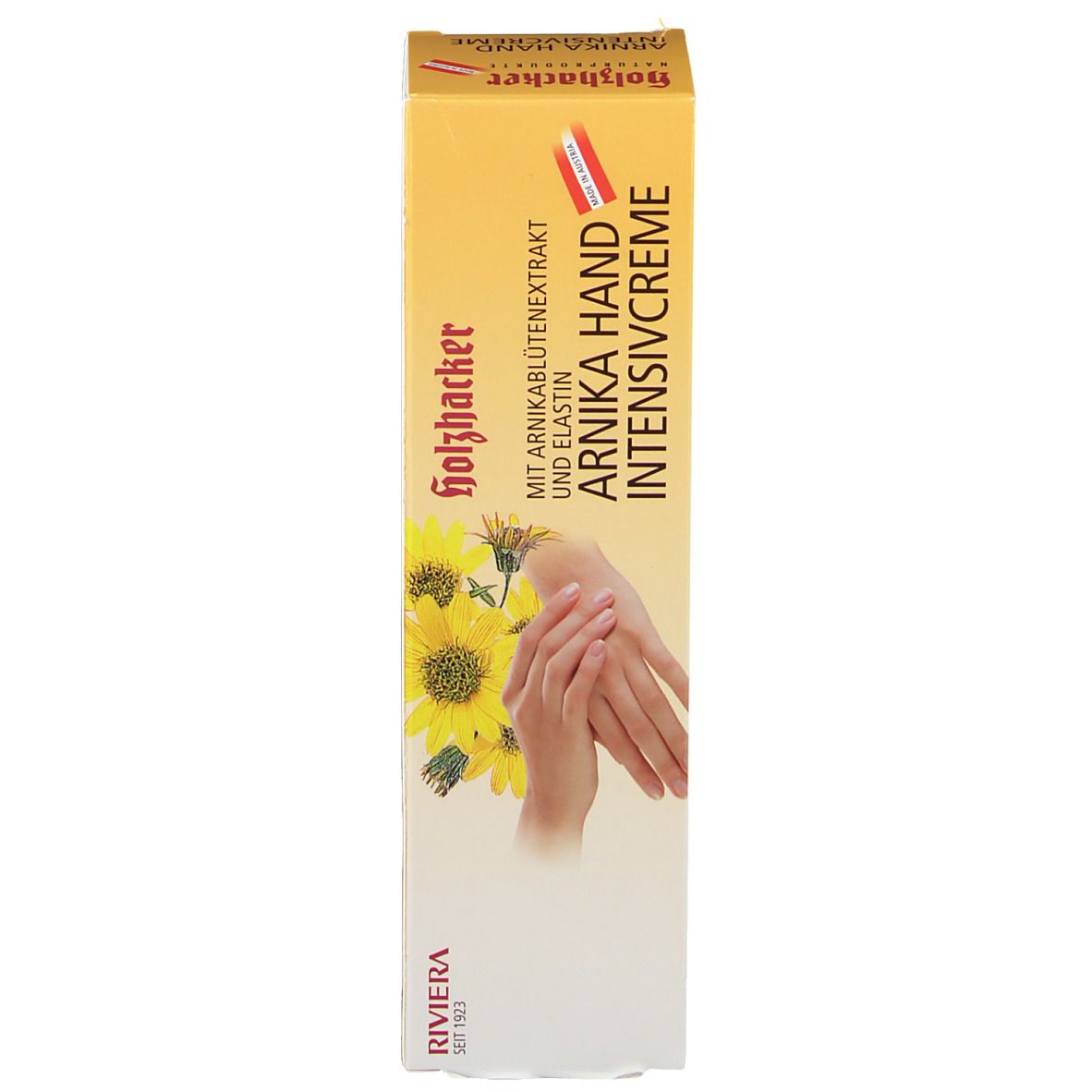 Verpackung, gelb. Text: Arnika Hand Intensivcreme, Sonnenblumen, Hände. Logo: Holzfäller.