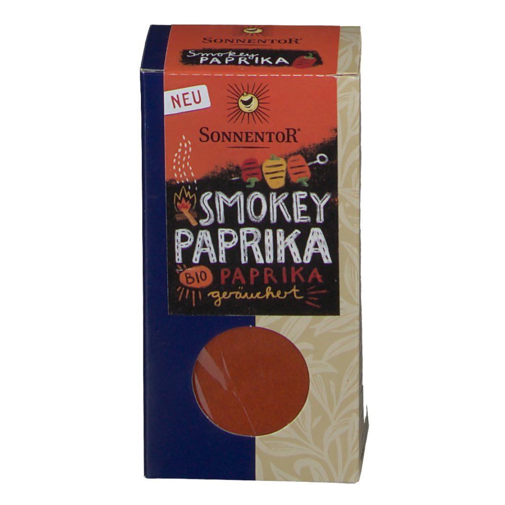 Vorderansicht der SonnentoR Smokey Paprika Verpackung. Sichtfenster mit Paprika. Aufschrift: Smokey Paprika, Bio, geräuchert. Logo: Sonne.