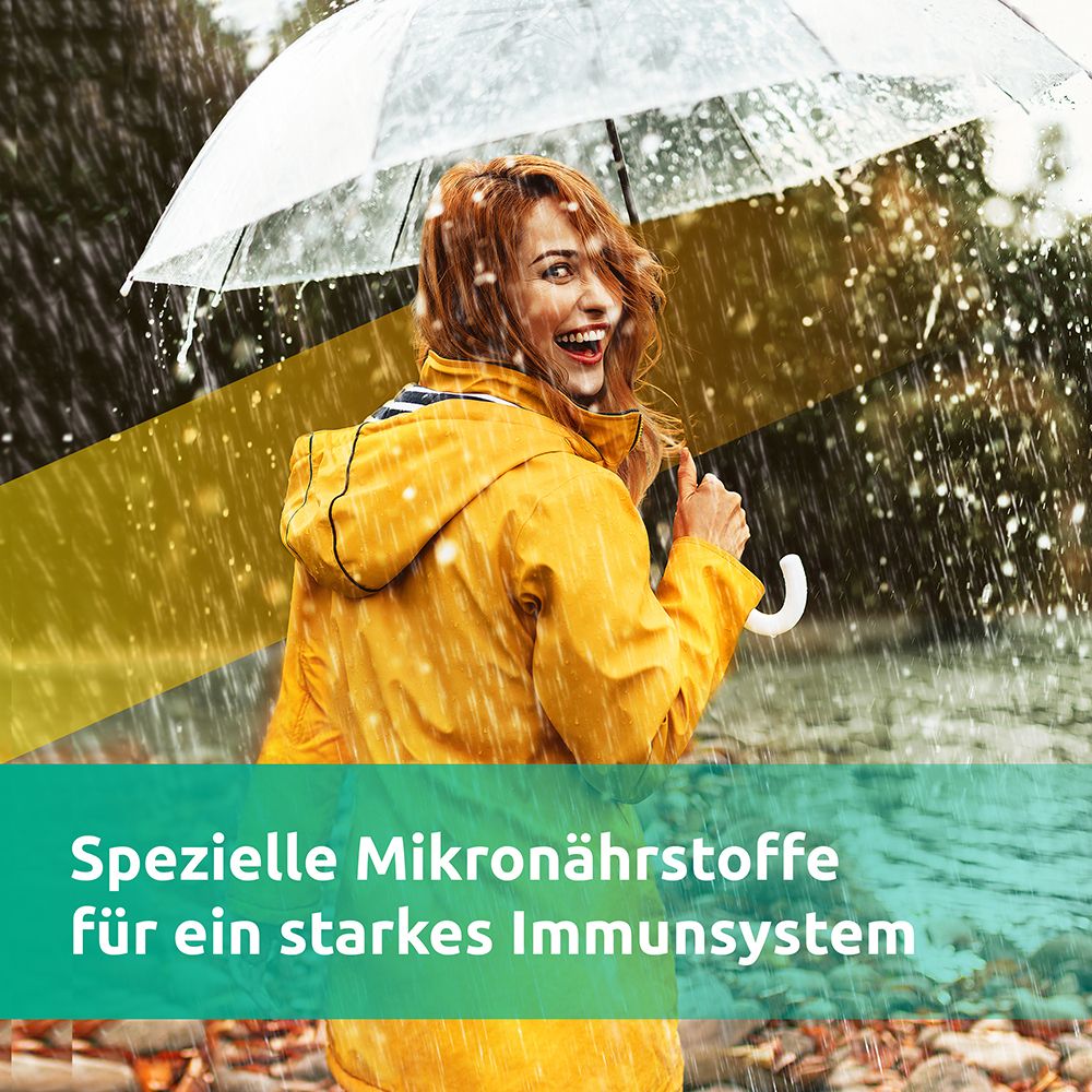 Frau unter Regenschirm im Regen. Text: Spezielle Mikronährstoffe für ein starkes Immunsystem.