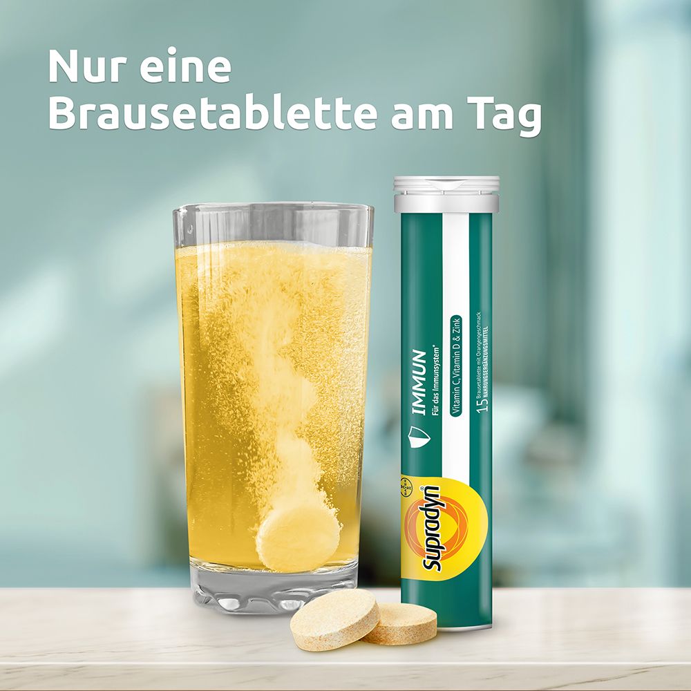 Glas mit aufgelöster Brausetablette und zwei Tabletten daneben. Text: Nur eine Brausetablette am Tag.