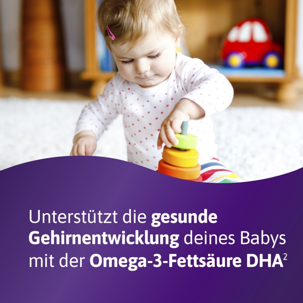 Baby spielt mit Spielzeug. Text: Unterstützt die gesunde Gehirnentwicklung deines Babys.