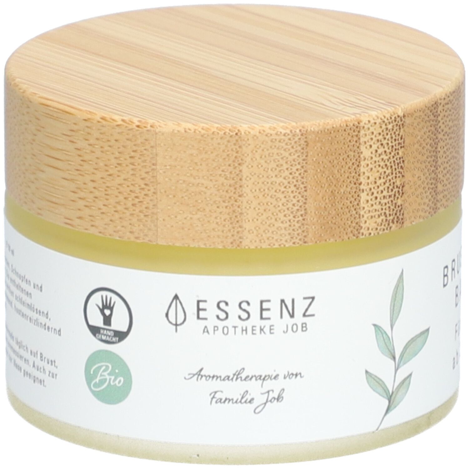 Creme-Tiegel mit Holzdeckel. Aufschrift: ESSENZ, Apotheke Job, Bio. Handgemacht-Siegel. Aromatherapie von Familie Job.