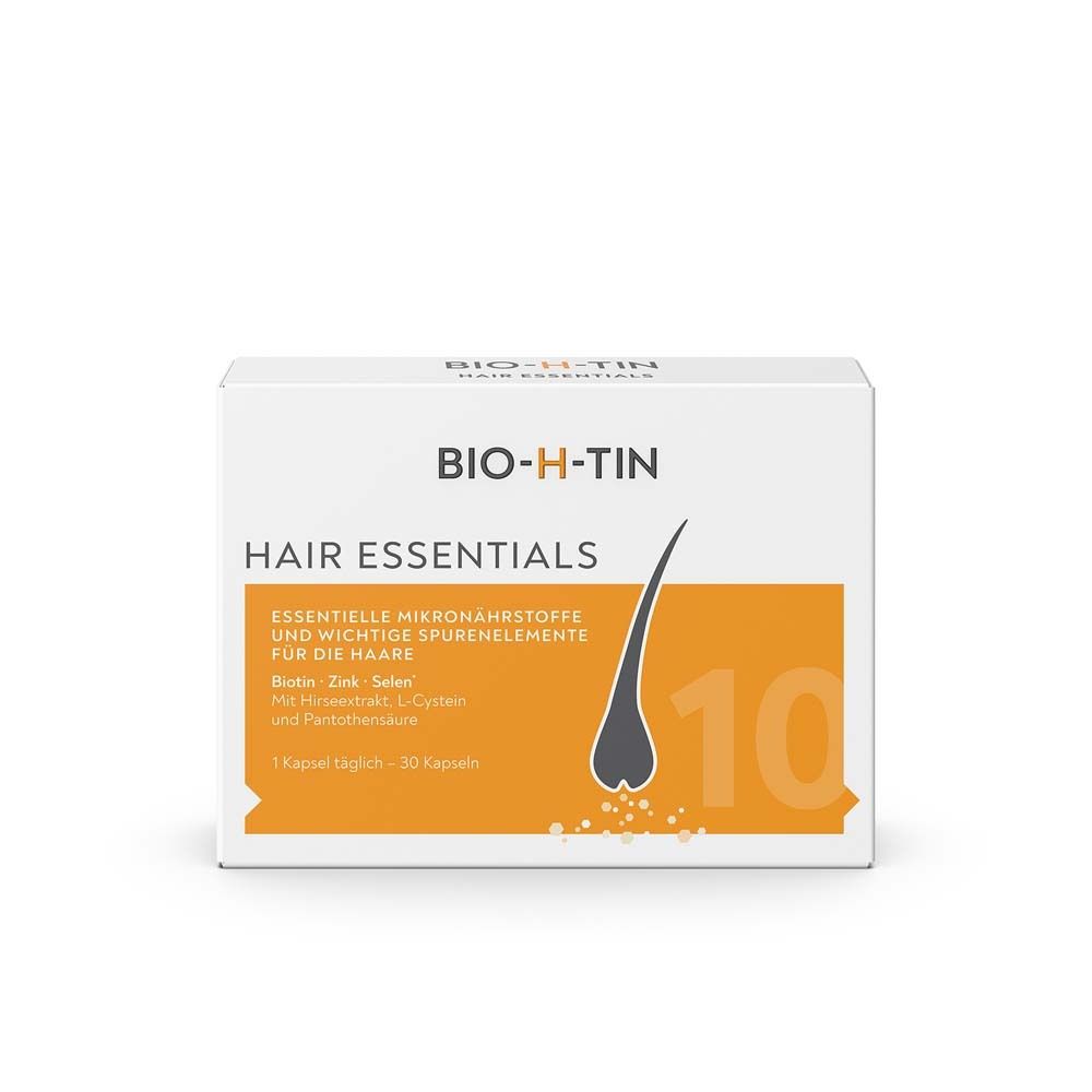 Weißer Karton mit Produktinformationen. Aufdruck: BIO-H-TIN Hair Essentials. Enthält 30 Kapseln.