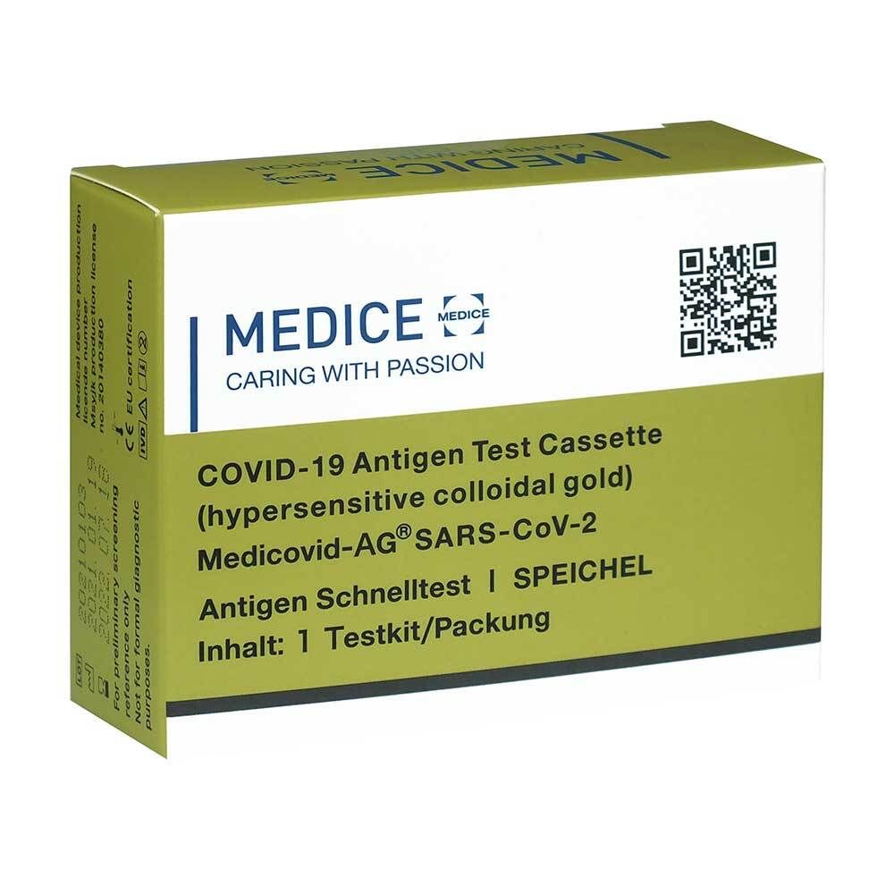 Schachtel mit Aufschrift Medicovid-AG, Text: COVID-19 Antigen Test Cassette, Antigen Schnelltest Speichel. Gold-farben und weiß.
