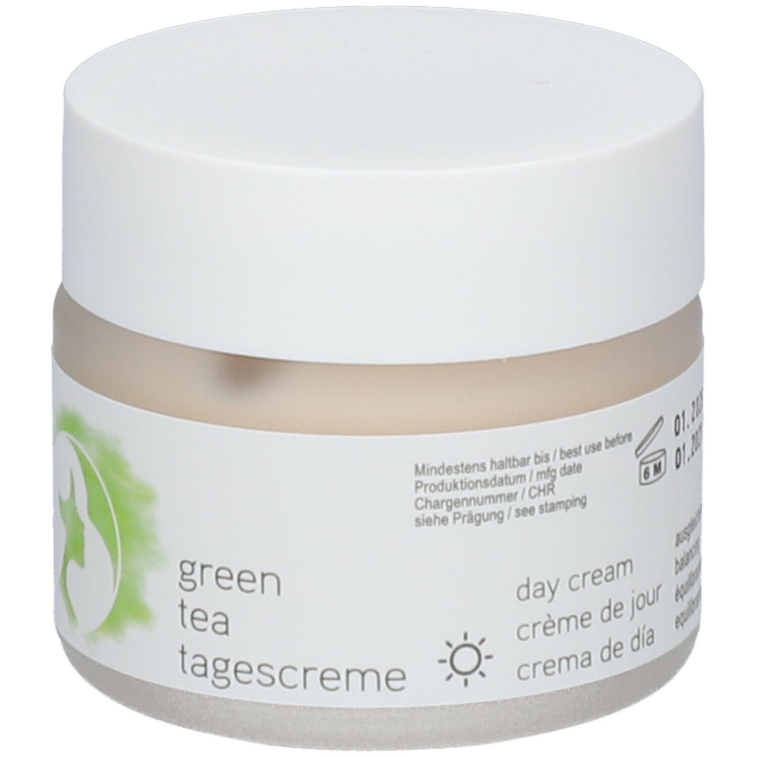 Creme-Tiegel mit weißem Deckel. Aufkleber mit grünen Blättern, Logo und Text 'green tea tagescreme'.