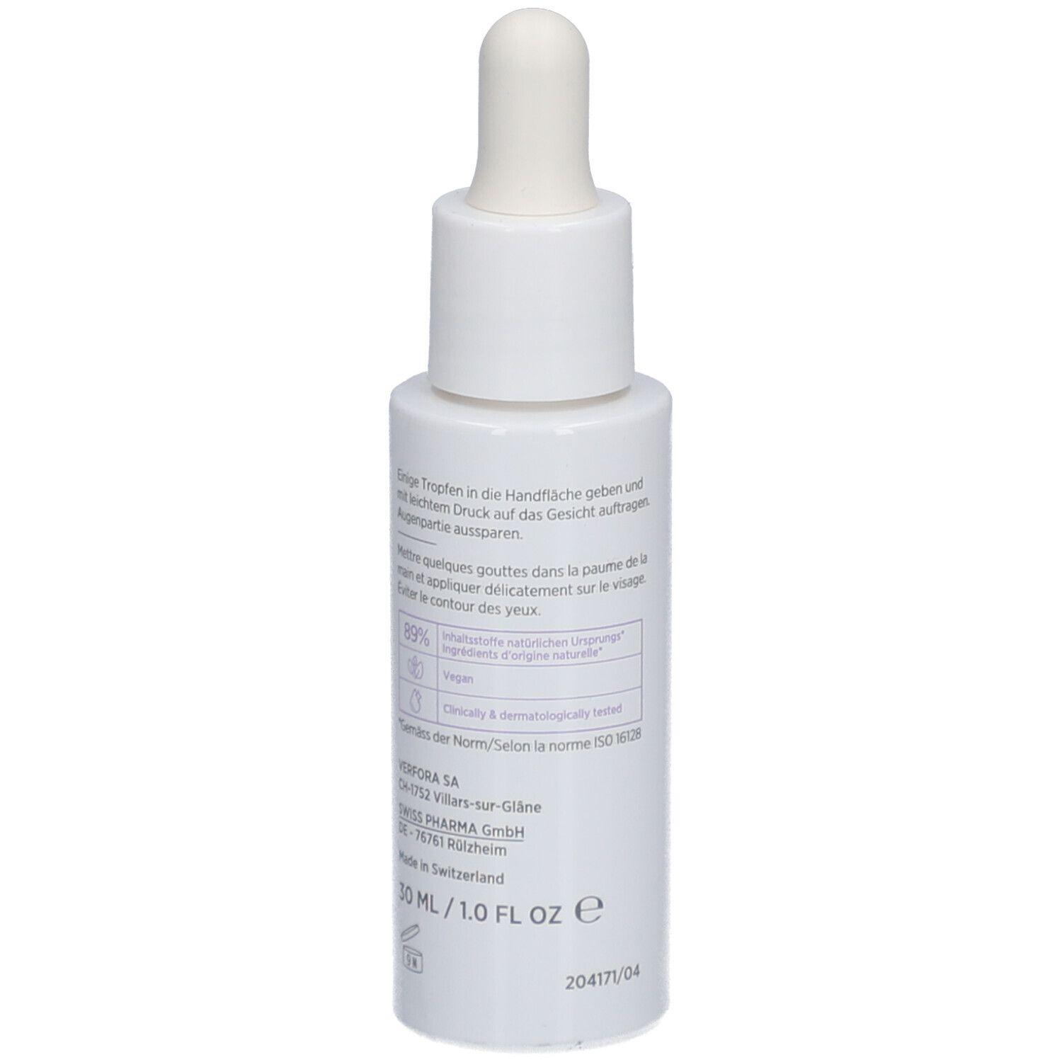 Weiße Flasche mit Pipette. Rückseite mit Text. Inhaltsstoffe, Anwendungshinweise. 30 ml/1.0 FL OZ. Hergestellt in der Schweiz.