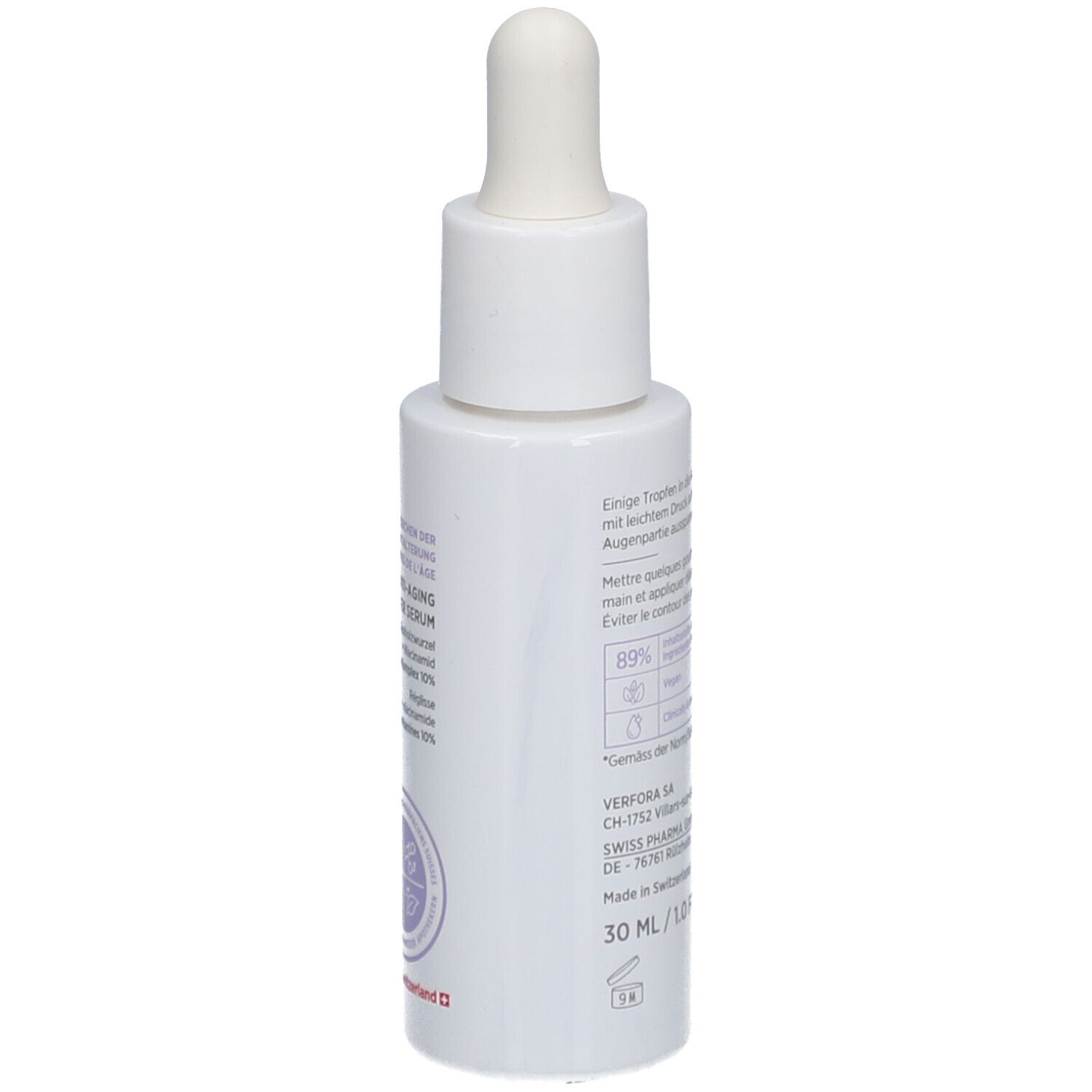 Weiße Flasche mit Pipette. Rückseite mit Text. 30 ml/1.0 FL OZ. Inhaltsstoffe, Anwendungshinweise. Hergestellt in der Schweiz.
