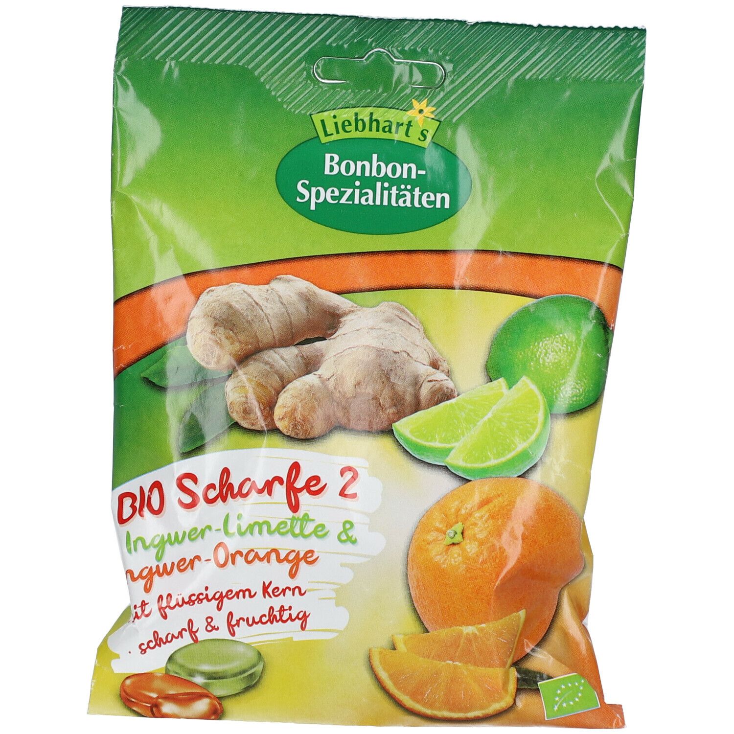 Verpackung mit Bonbons. Abbildung von Ingwer, Limette und Orange. Text: Bio Scharfe 2 Ingwer-Limette & Ingwer-Orange.