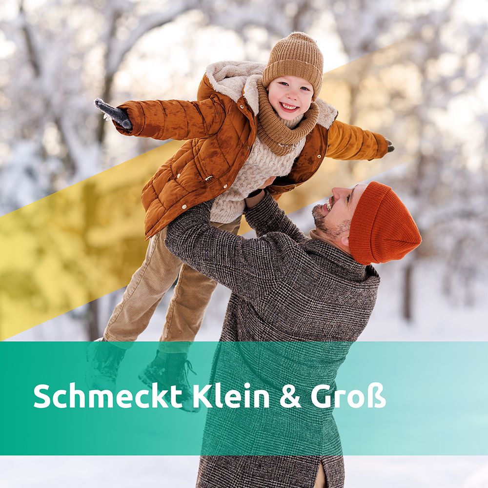 Vater und Kind im Schnee. Text: "Schmeckt Klein & Groß".