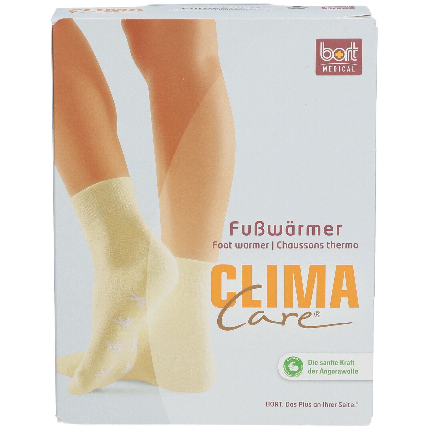 Verpackung mit Fußwärmern. Aufdruck: CLIMA Care, Fußwärmer, bort MEDICAL. Abbildung: Füße mit gelben Socken.