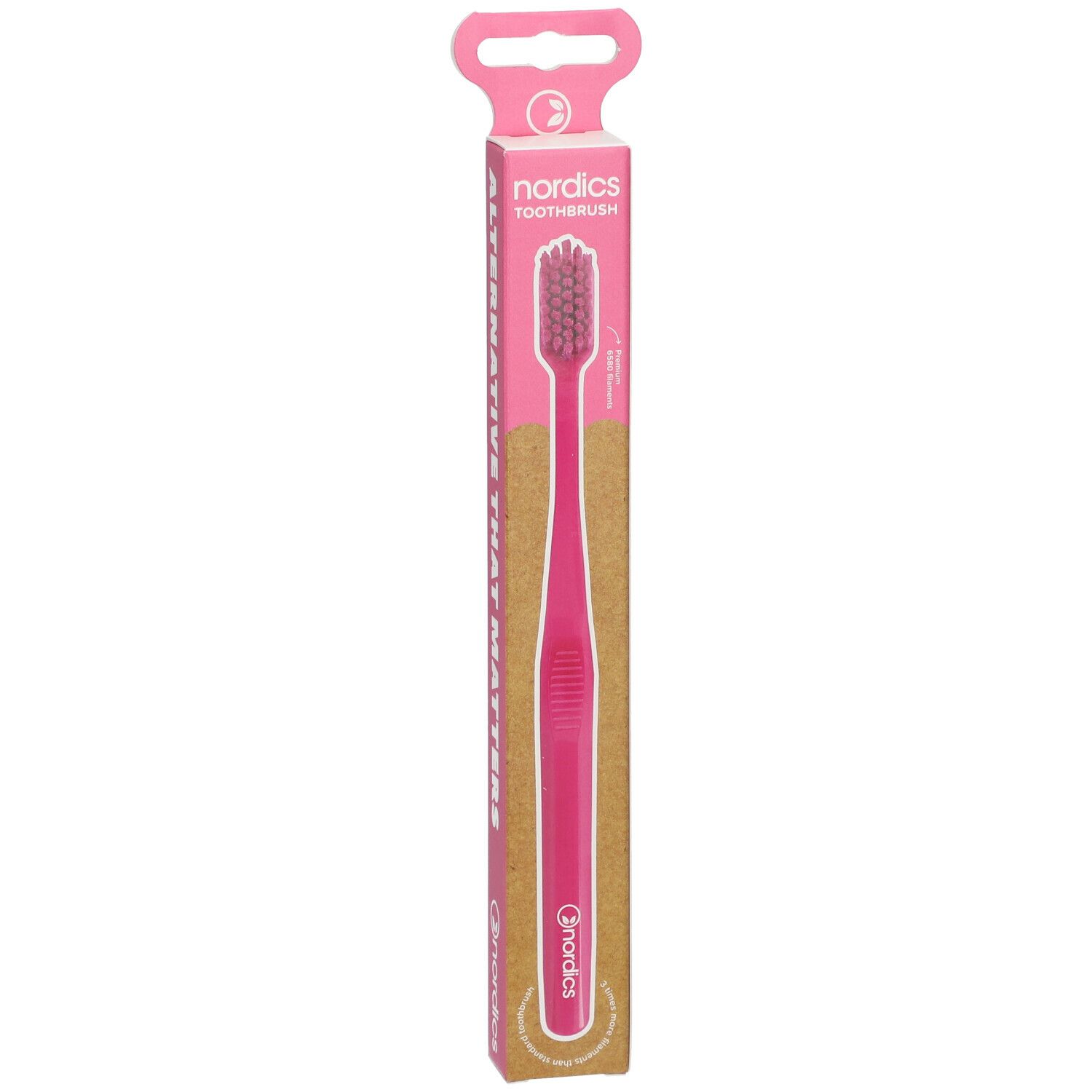 Rosa Zahnbürste in Verpackung. Aufdruck: nordics TOOTHBRUSH. Griff und Borsten rosa. Verpackung mit Aufhänger.