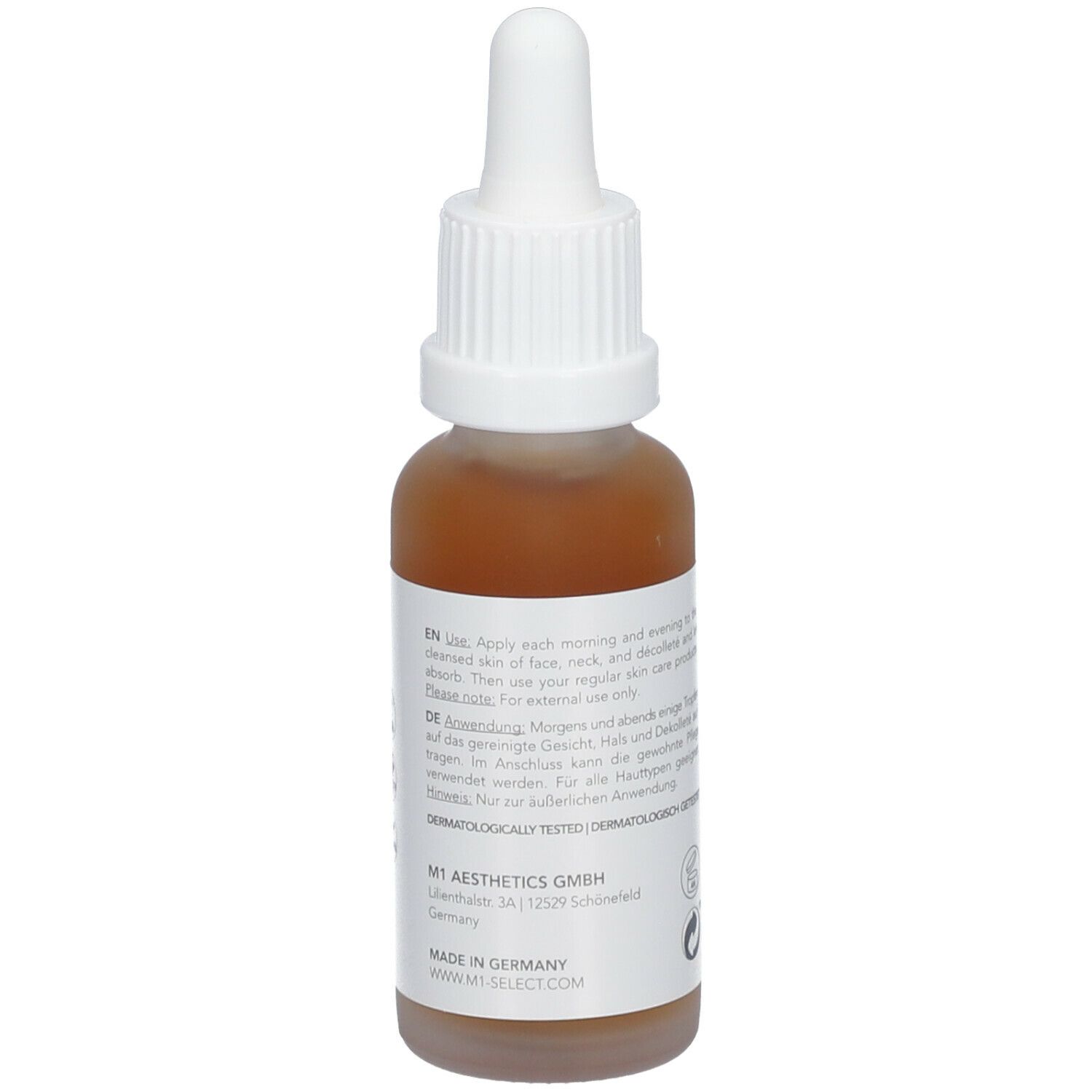 Braune Serumflasche mit weißem Deckel. Aufschrift: M1 SELECT SMOOTH. Text auf der Rückseite. Hergestellt in Deutschland.