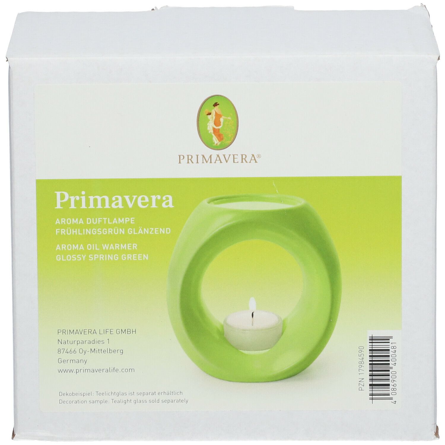 Produktverpackung mit grüner Aroma-Duftlampe. Weißer Karton mit Produktabbildung und Text.