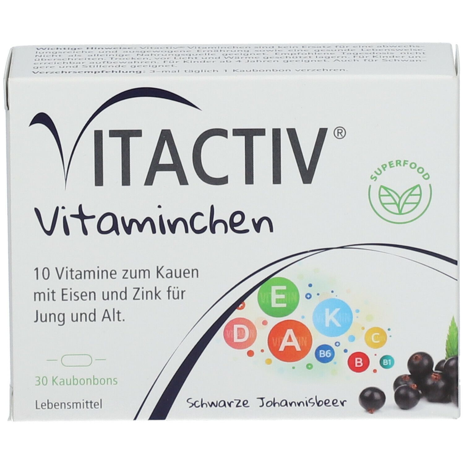 Weißer Karton mit VITACTIV Vitaminchen. Schwarze Johannisbeere, 30 Kautabletten. Aufdruck mit Vitaminen.