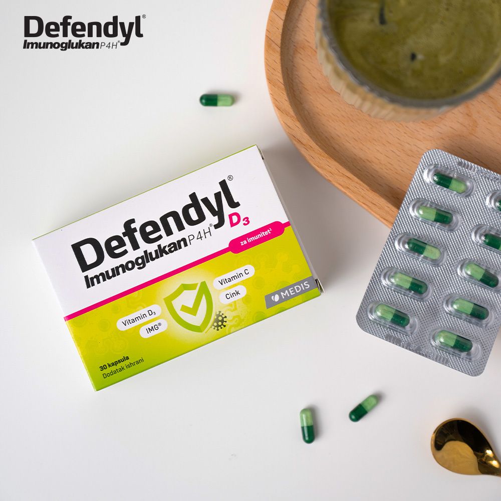 Defendyl-Imunoglukan P4H D3 Kapseln und Schachtel. Vitamin D3, C und Zink. Kapseln verstreut.