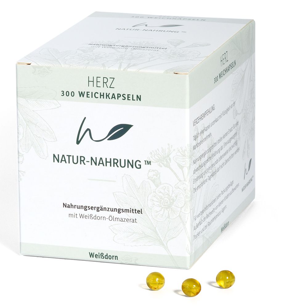 Weichkapseln-Packung. Produktname: HERZ. Marke: NATUR-NAHRUNG™. 3 Kapseln liegen daneben.