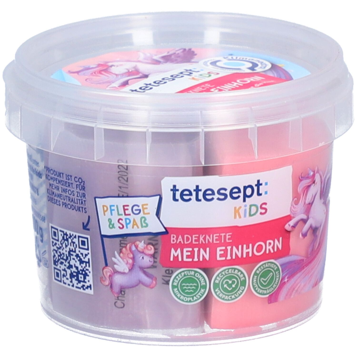Badeknete in einem transparenten Behälter. Auf der Vorderseite sind Logos und ein Einhorn abgebildet. Der Behälter ist zweifarbig gefüllt.
