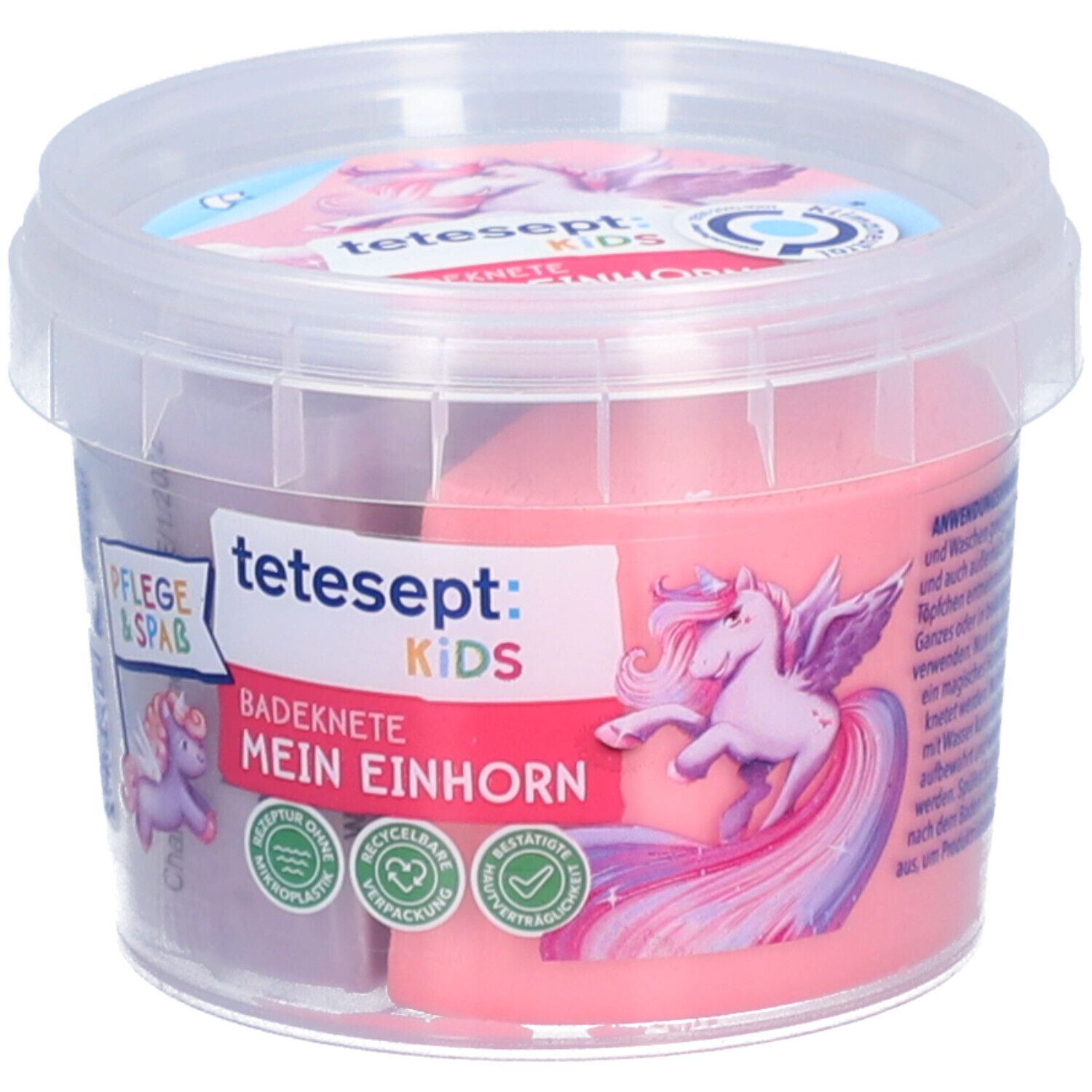 Badeknete in einem transparenten Behälter. Auf der Vorderseite sind Logos und ein Einhorn abgebildet. Der Behälter ist zweifarbig gefüllt.