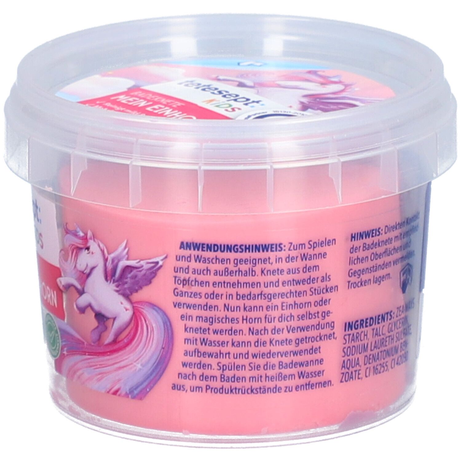 Rosa Badeknete in einem transparenten Behälter. Auf der Seite sind Anwendungshinweise und Inhaltsstoffe angegeben.