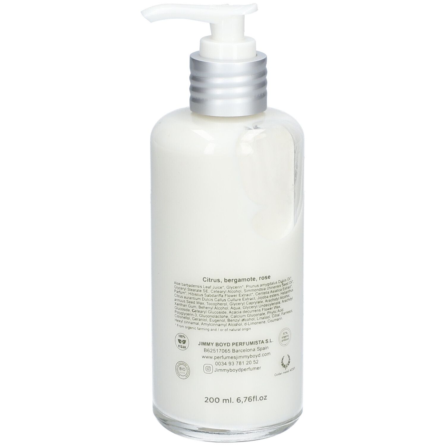 Rückansicht der Körperlotion-Flasche mit Pumpe. Aufschrift: Lemon & Rose, Jimmy Boyd. Text mit Inhaltsstoffen.