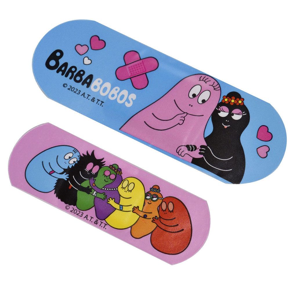 Zwei Pflaster mit Barbapapa-Motiven. Ein blaues und ein rosa Pflaster mit Figuren und Herzen.