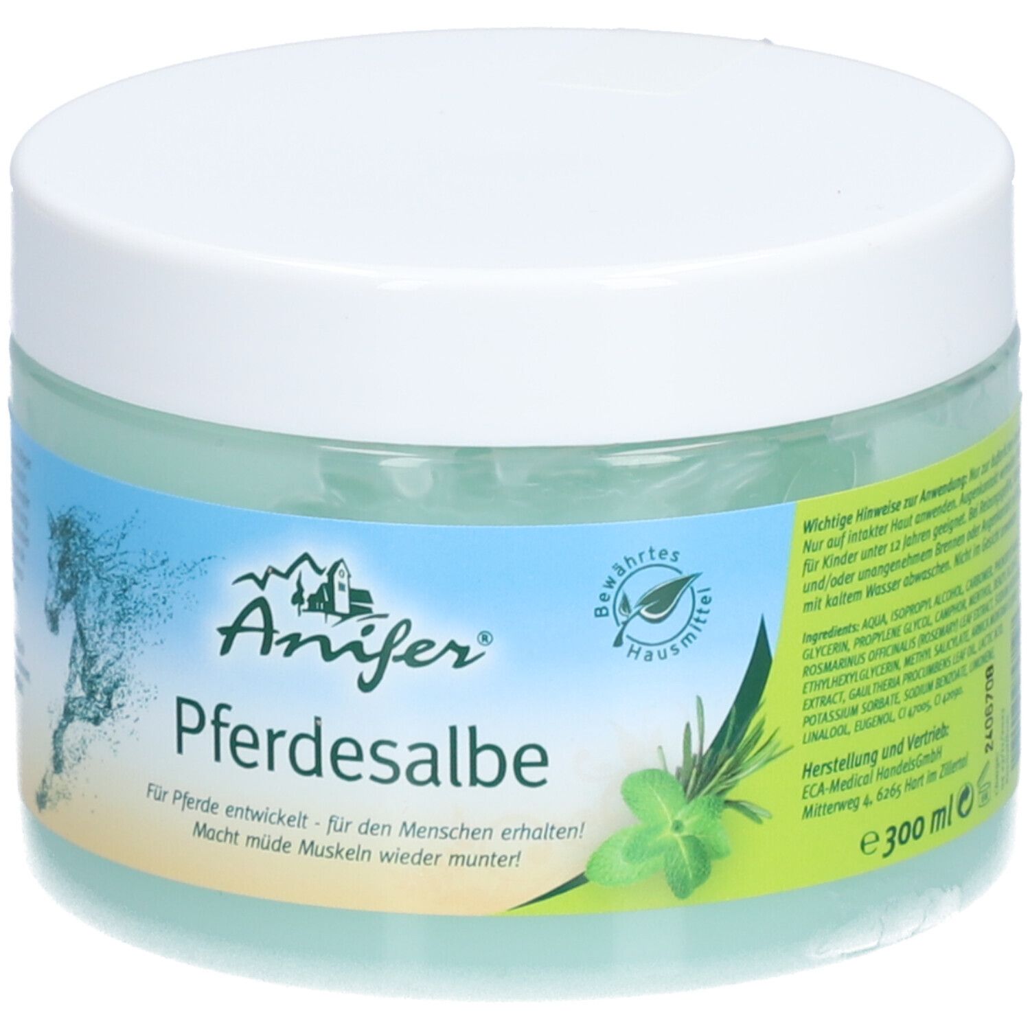 Runde Dose mit weißem Deckel. Auf dem Etikett: Logo, Produktname, und ein springendes Pferd. Grünliche Salbe sichtbar. 300ml.