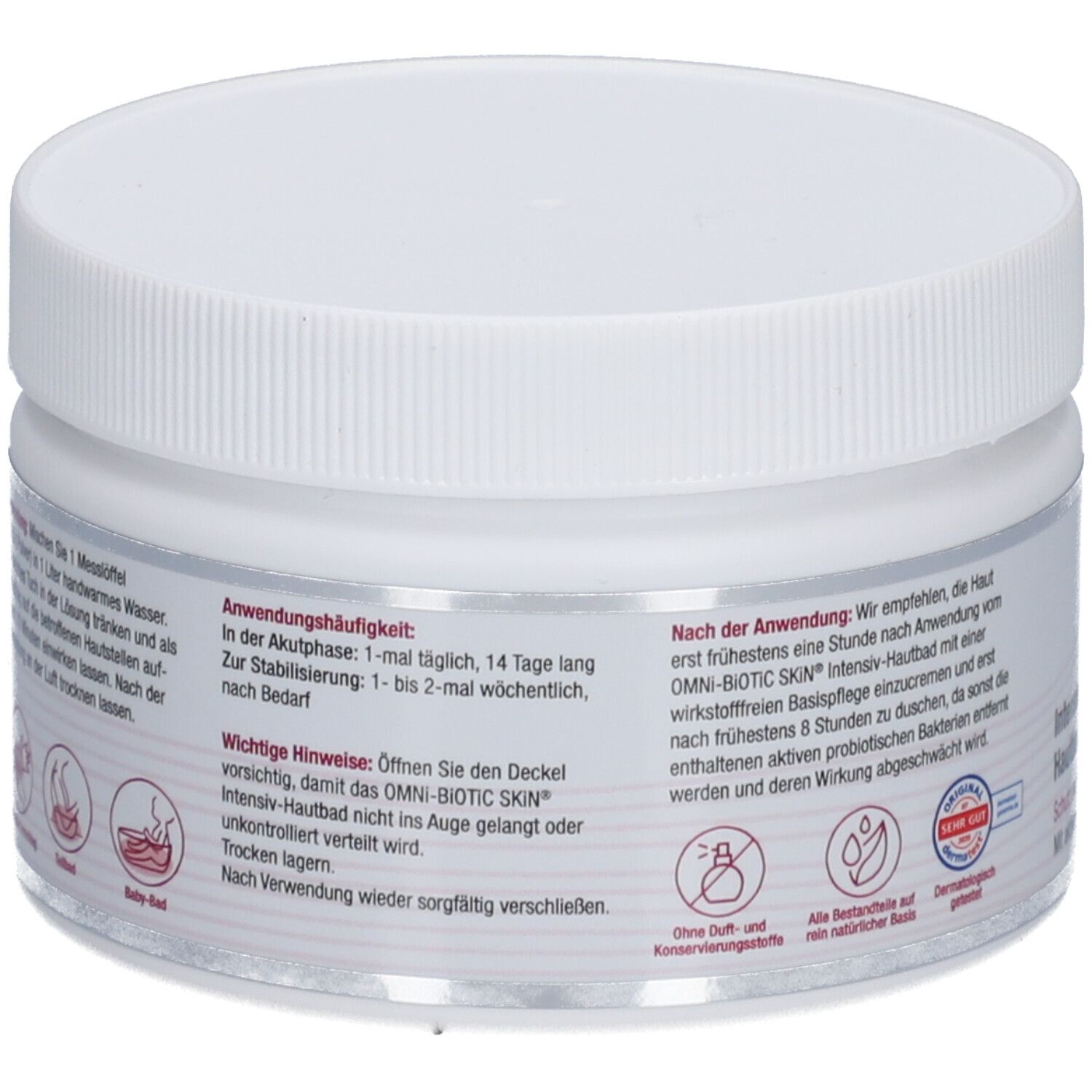 Weißer Tiegel mit Schraubverschluss. Aufschrift OMNi-BiOTiC SKIN Intensiv-Hautbad. Rückseite mit Text und Logos.
