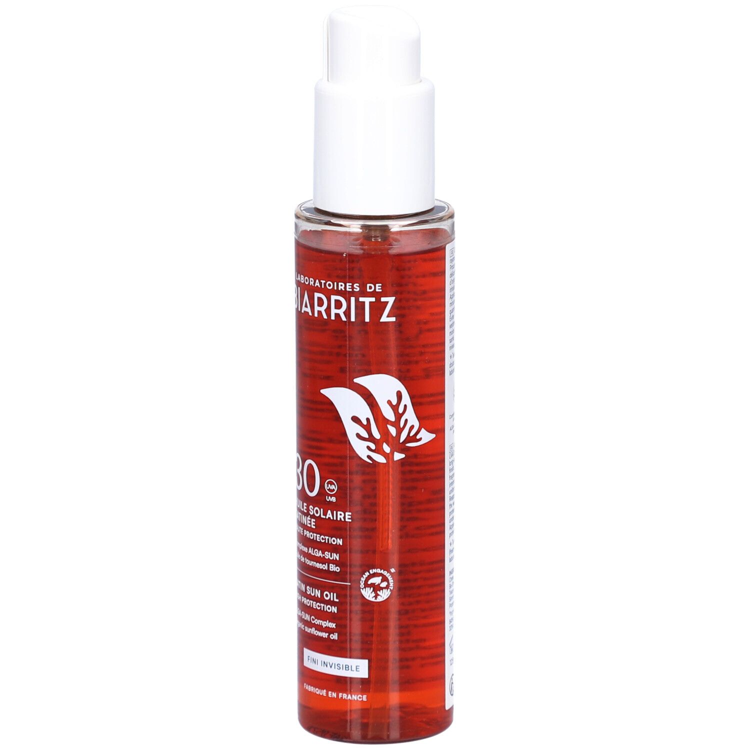 Sonnenschutzöl von Laboratoires de Biarritz. Transparente Flasche mit weißem Pumpkopf. Rote Flüssigkeit sichtbar. Text: SPF30, Huile Solaire.
