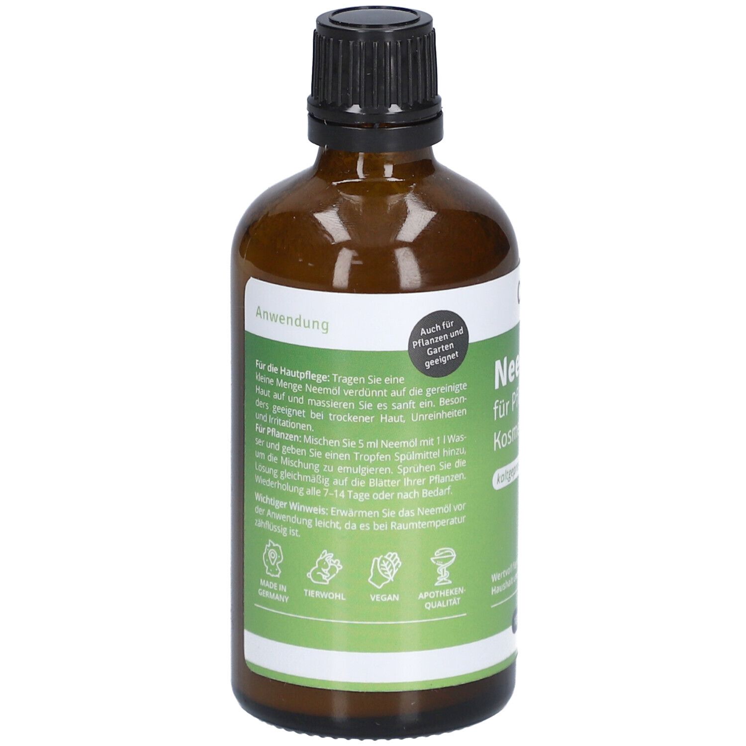 Rückseite der Flasche. Etikett mit Anwendungs- und Inhaltsstoffinformationen. Siegel: Vegan, Apothekenqualität.