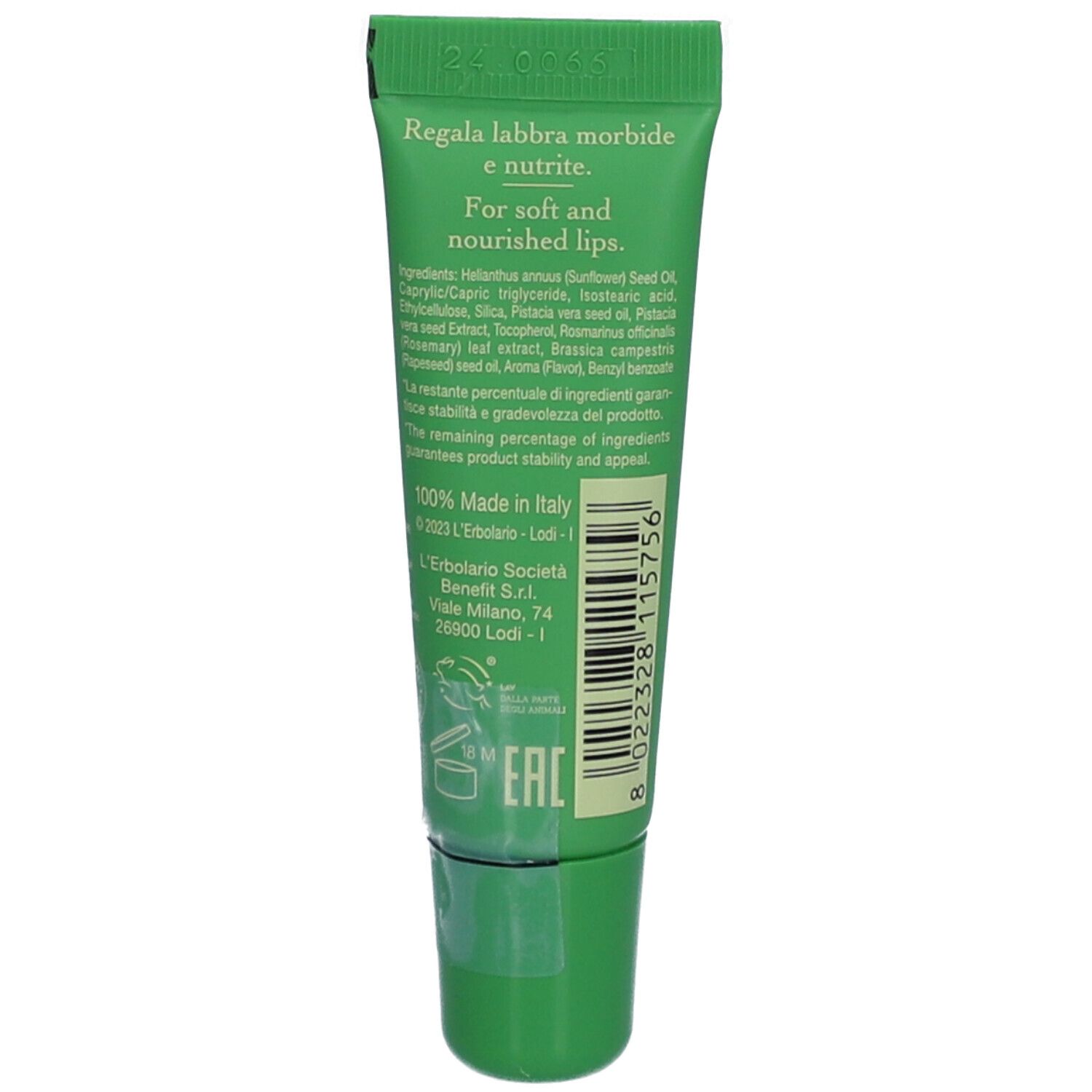 Grüne Tube mit Lippenbalsam. Enthält Inhaltsstoffe und Herstellungsland Italien.