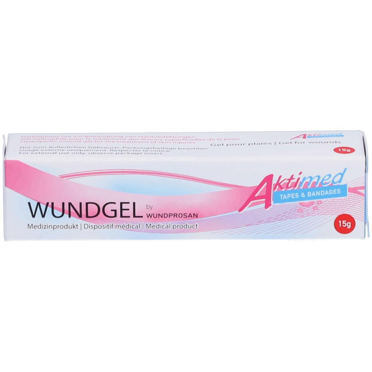 Schachtel mit Wundgel. Aufschrift: Wundgel, Aktimed. 15g. Medizinprodukt. Gel für Wunden. Weiß-rosa Design.