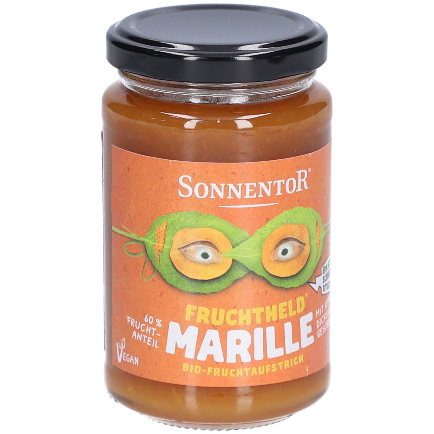Glas mit Aufstrich. Orangefarbenes Etikett mit Logo, Illustration und Schriftzug 'Marille'. Schwarzer Deckel.