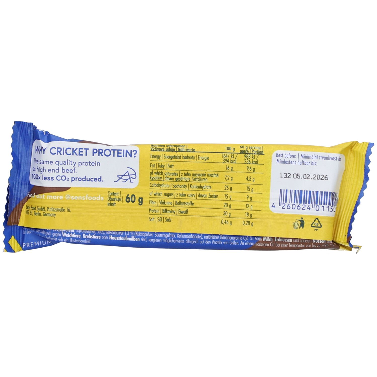 Rückseite der Proteinriegel-Verpackung. Gelb und blau. Text: "WHY CRICKET PROTEIN?" und Nährwertangaben. Mindesthaltbarkeitsdatum.