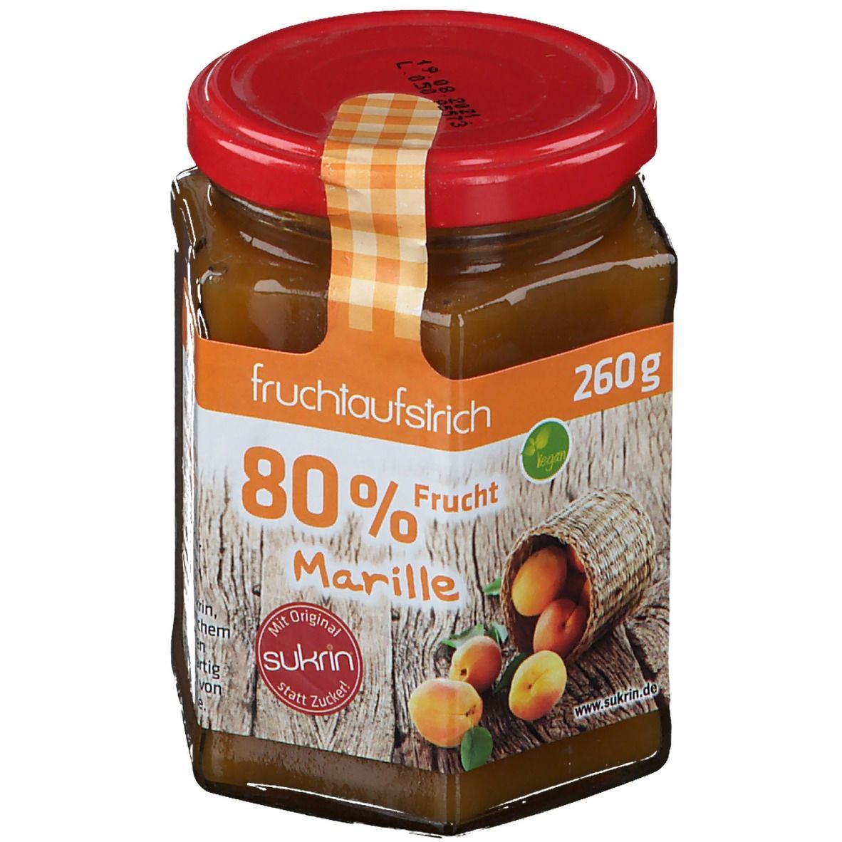 Glas mit Aprikosen-Fruchtaufstrich, 80% Fruchtanteil. Roter Deckel, Etikett mit Marille und Sukrin-Logo. Vegan.