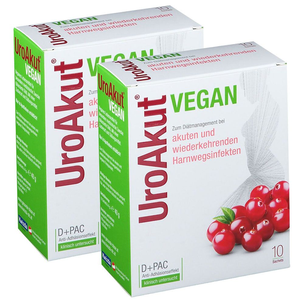 Zwei weiße Kartons mit roter und grüner Schrift. Aufschrift: UroAkut, Vegan. Abbildung von Cranberrys.